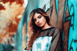 Miley Cyrus, Seen Here With Co-Star Emily Osmand In An Episode Of "Hannah Montana" In June